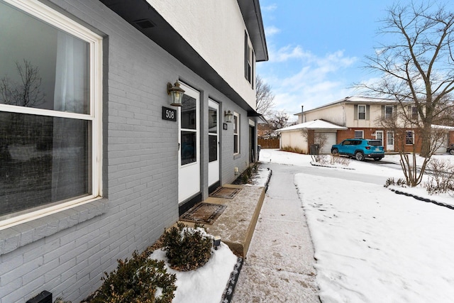 view of snowy exterior