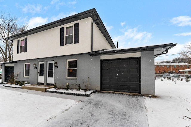 view of front of property featuring a garage