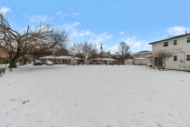 view of yard covered in snow