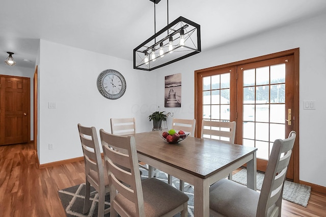 dining room featuring hardwood / wood-style flooring