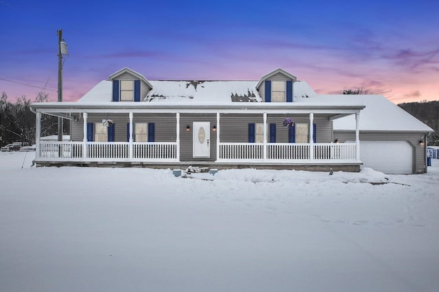 view of front of house with an outbuilding and a garage