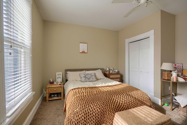 bedroom with carpet floors, a closet, and ceiling fan