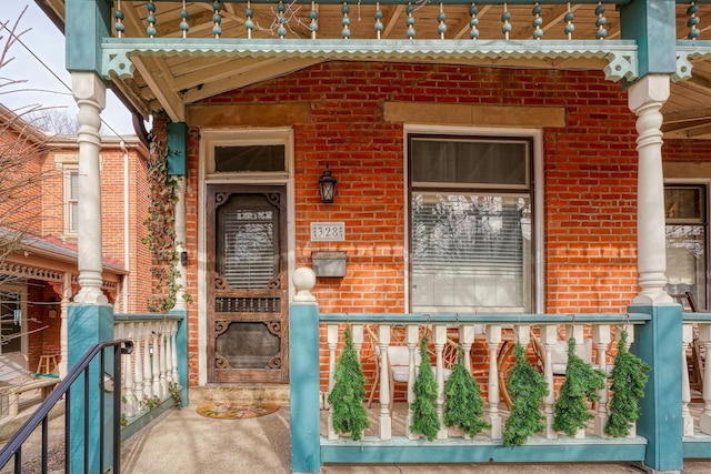 property entrance featuring covered porch