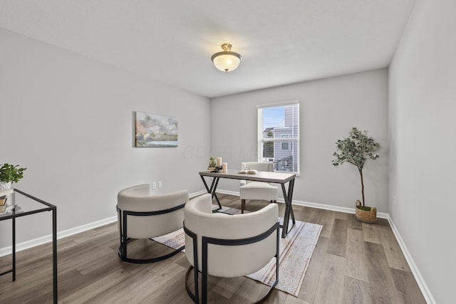 office with hardwood / wood-style flooring