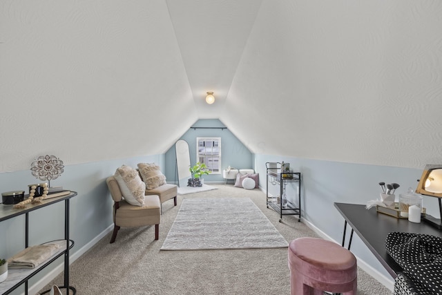 living area with carpet floors and lofted ceiling