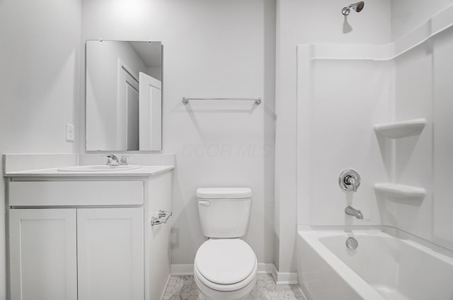 full bath featuring toilet, washtub / shower combination, tile patterned flooring, baseboards, and vanity