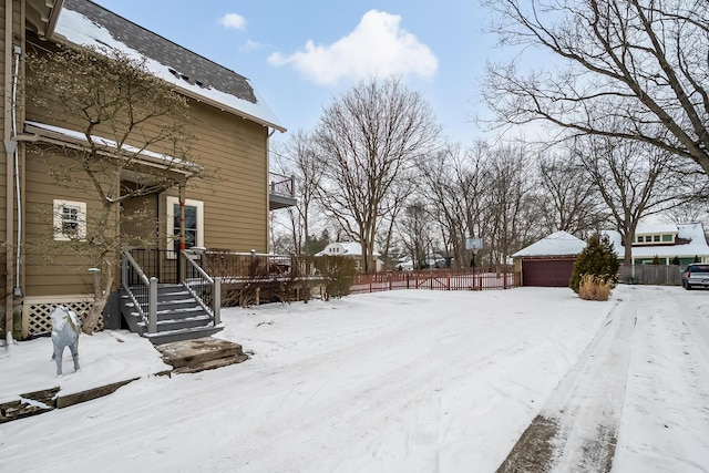 view of yard layered in snow