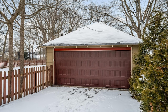 view of snow covered garage