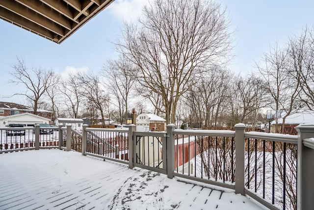 view of snow covered deck