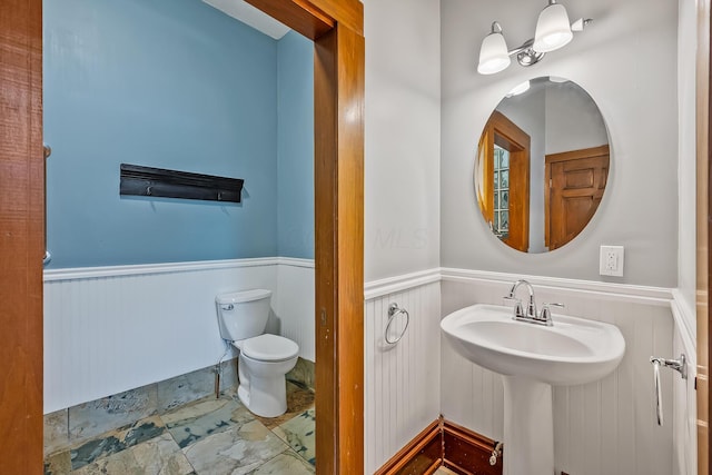 bathroom with sink and toilet