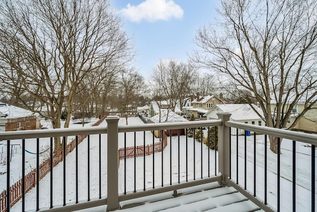 view of snow covered deck