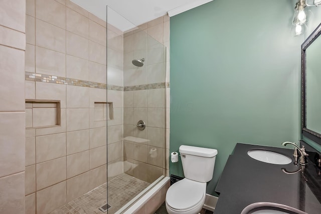 bathroom with vanity, toilet, and an enclosed shower