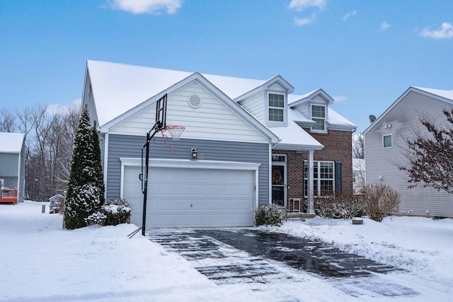 view of front of property featuring a garage