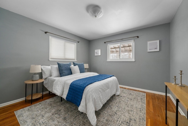 bedroom featuring dark hardwood / wood-style floors