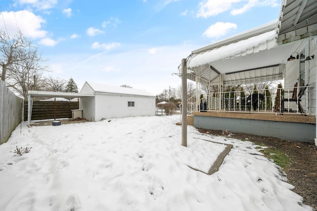 view of yard covered in snow