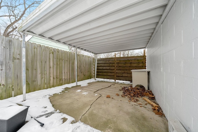 view of snow covered patio