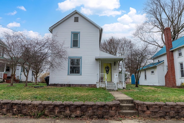 view of front facade with a front yard