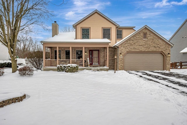 view of front of house featuring a porch and a garage