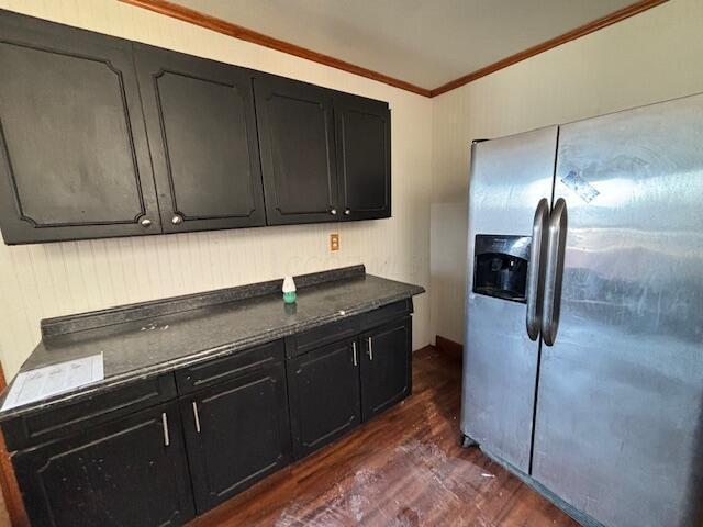 kitchen with ornamental molding, dark wood-type flooring, and stainless steel fridge with ice dispenser