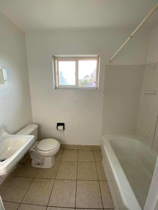 full bathroom with tile patterned floors,  shower combination, toilet, and sink