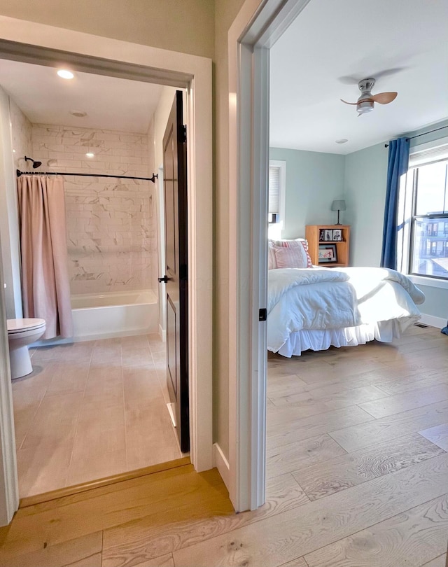 unfurnished bedroom featuring ceiling fan and light hardwood / wood-style flooring