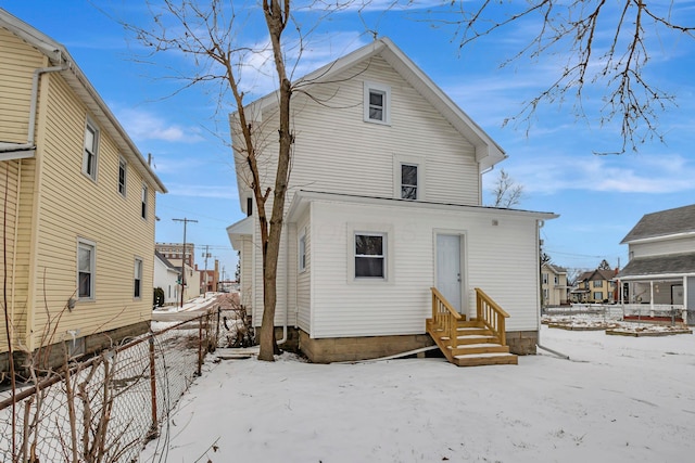 view of snow covered property