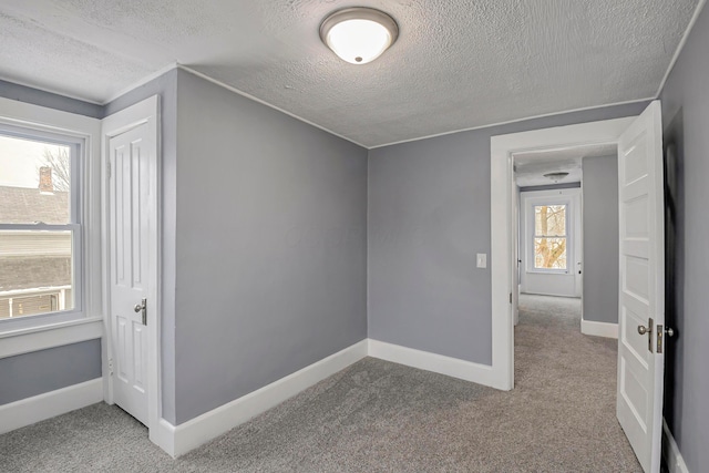 interior space featuring a textured ceiling