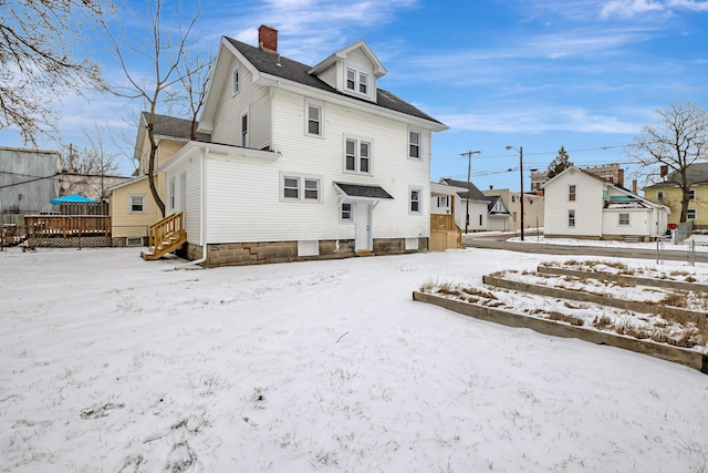 view of snow covered property