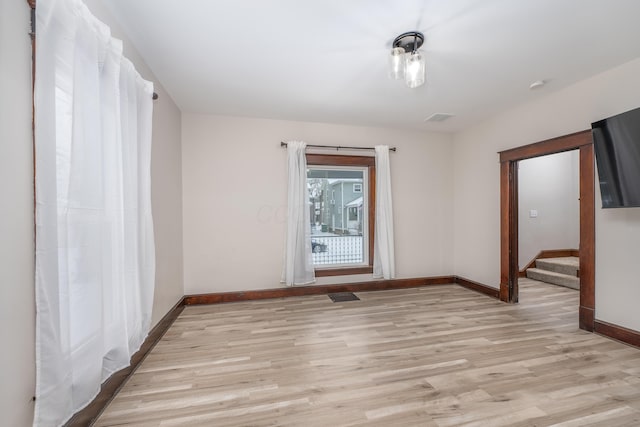 empty room featuring light hardwood / wood-style flooring