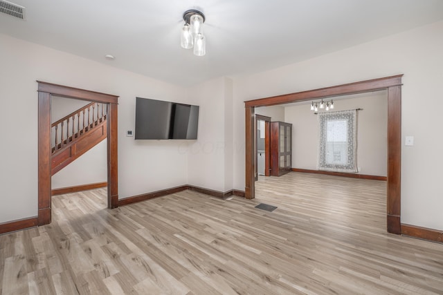 empty room with light wood-type flooring