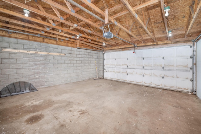 garage featuring a garage door opener