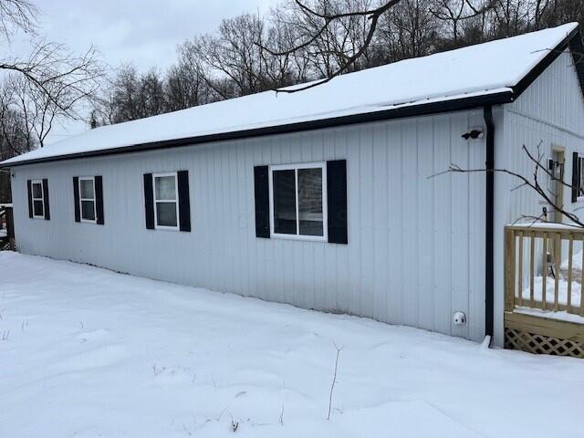 view of snow covered property