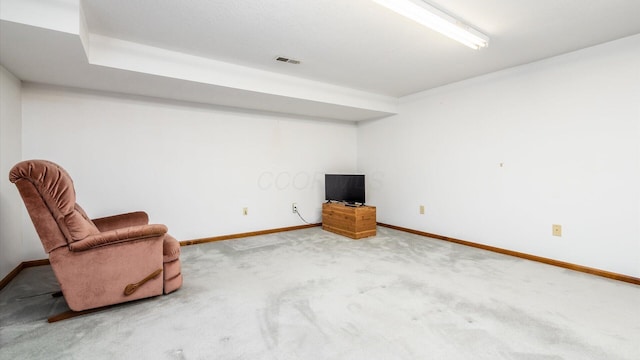 unfurnished room featuring carpet flooring, visible vents, and baseboards