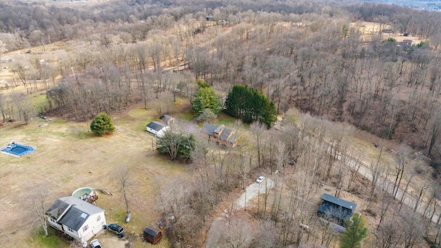 drone / aerial view with a view of trees