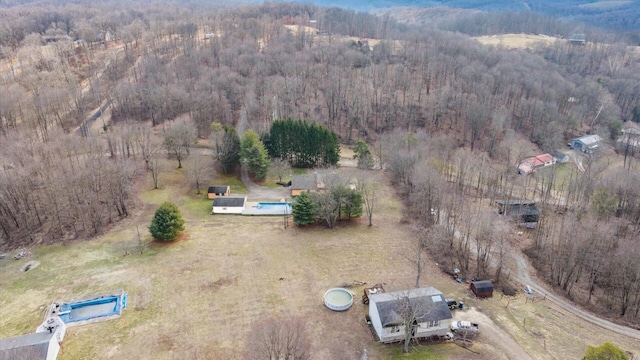 bird's eye view featuring a view of trees