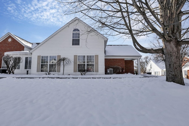 view of snow covered house