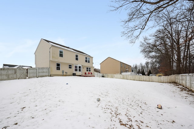 view of snow covered house