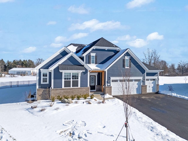 craftsman-style house featuring a garage