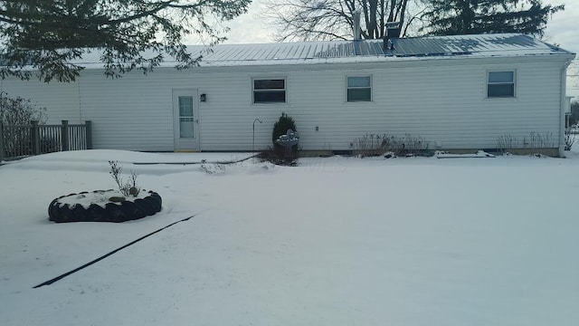 view of snow covered property