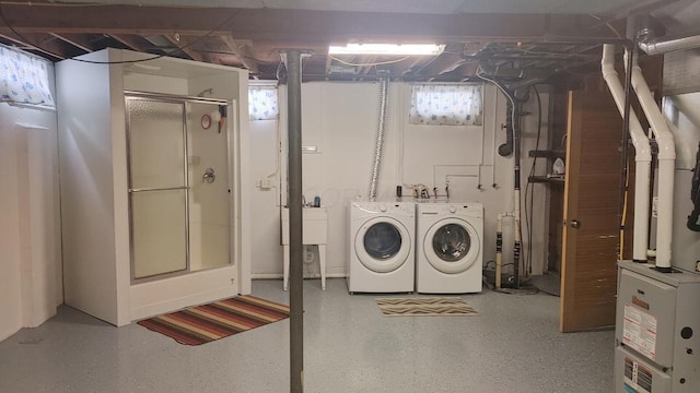 laundry area with washing machine and dryer