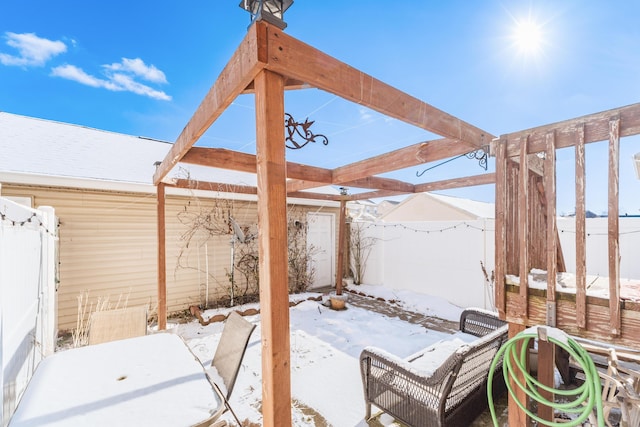 view of snow covered patio