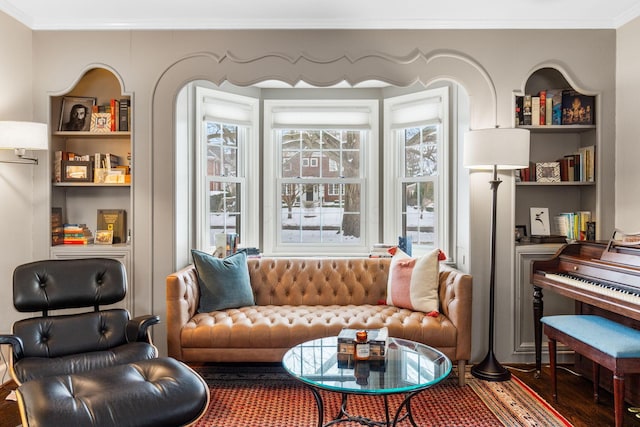 living area featuring crown molding and dark hardwood / wood-style floors