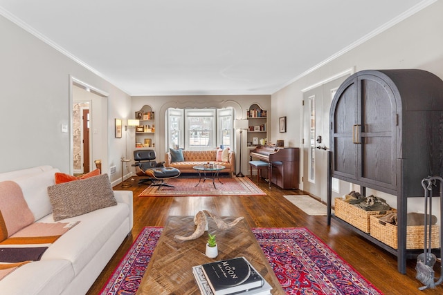 living room with dark hardwood / wood-style flooring and crown molding