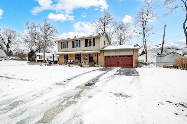 view of front of house with a garage and covered porch