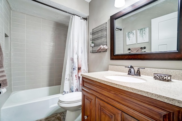 full bathroom featuring shower / bath combination with curtain, vanity, and toilet