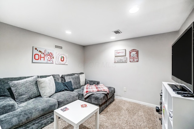 living room featuring light carpet