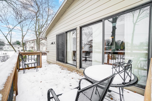 view of snow covered deck