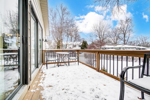 view of snow covered deck