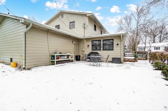 view of snow covered house