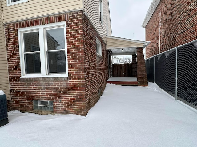 view of snow covered property